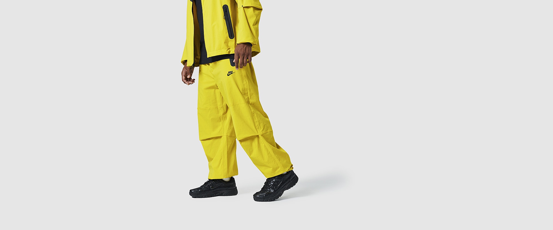 nike tech suit yellow