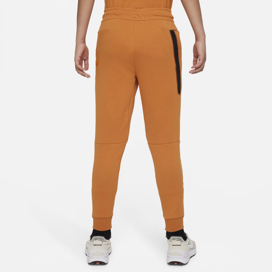 orange nike tech pants