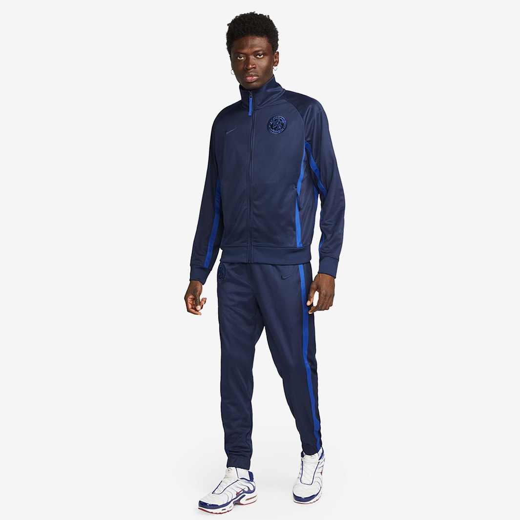 Nike Chelsea FC 22/23 NSW Nike Air Pant - College Navy/Rush Nike Chelsea FC 22/23 NSW Nike Air Pant - College Navy/Rush
