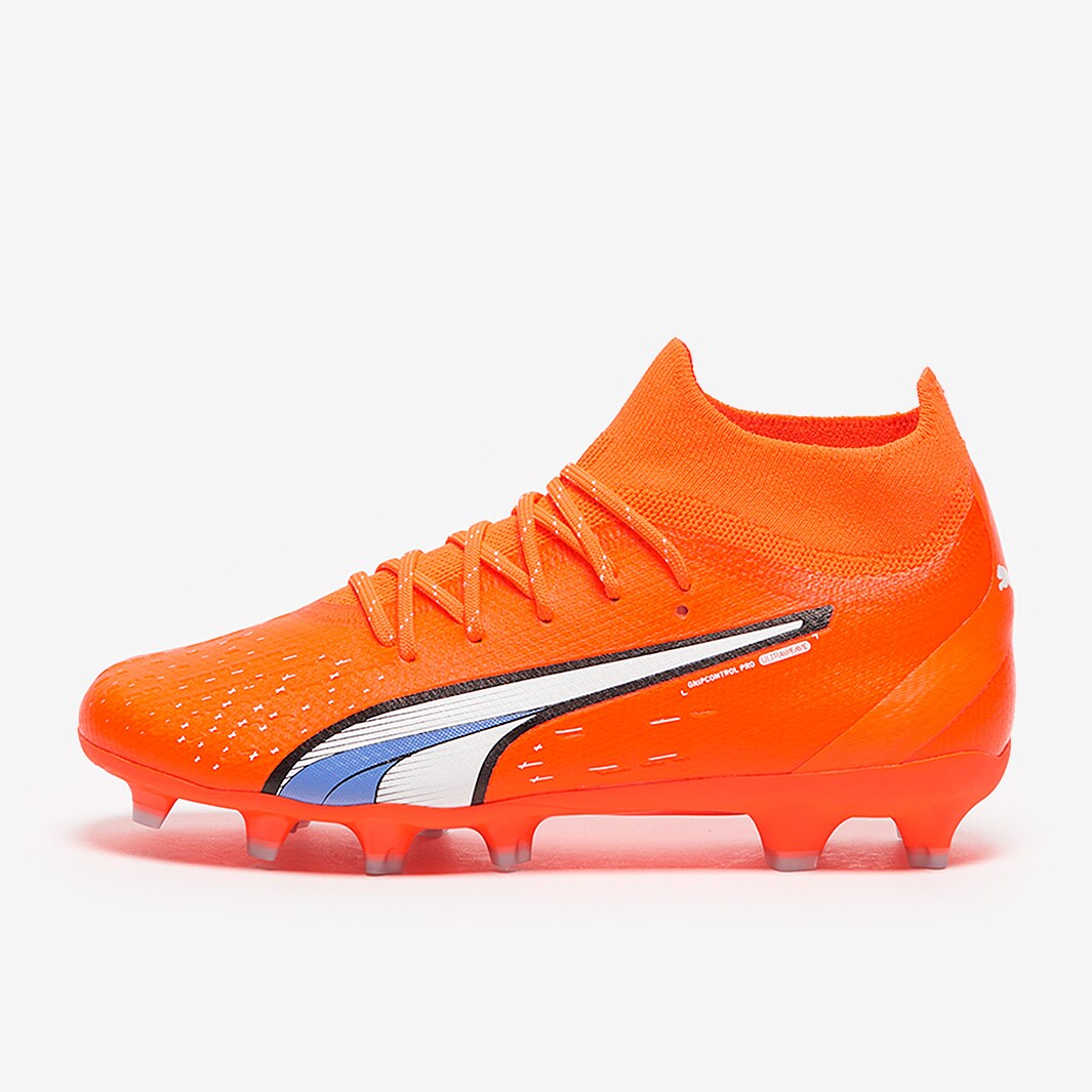 kids orange football cleats