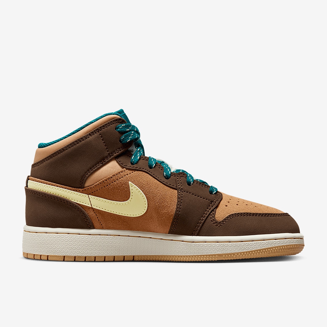 brown and green jordans
