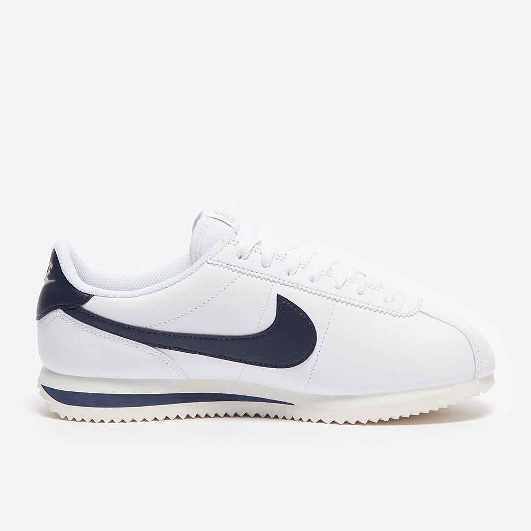 white and navy blue cortez