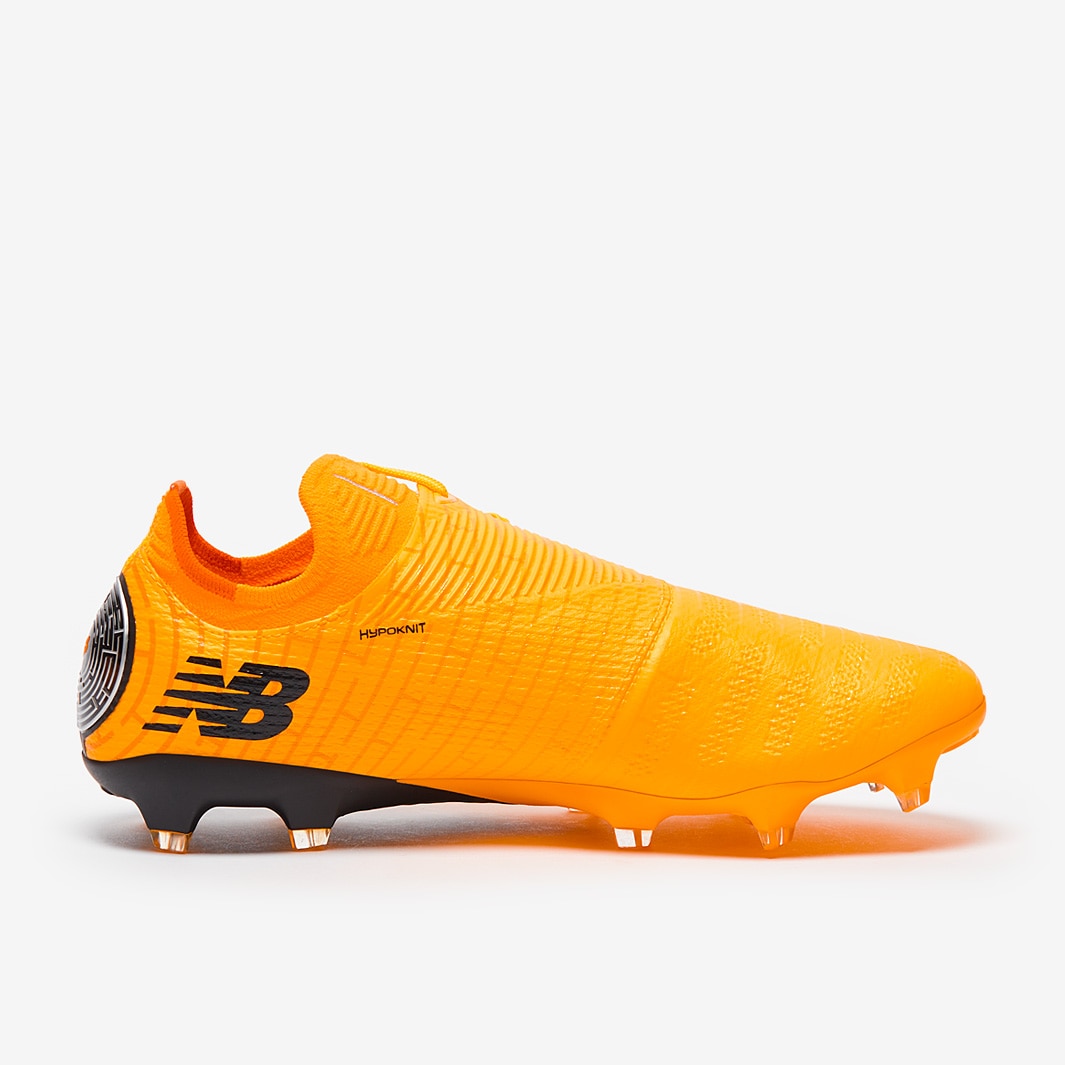 New balance football boots orange best sale