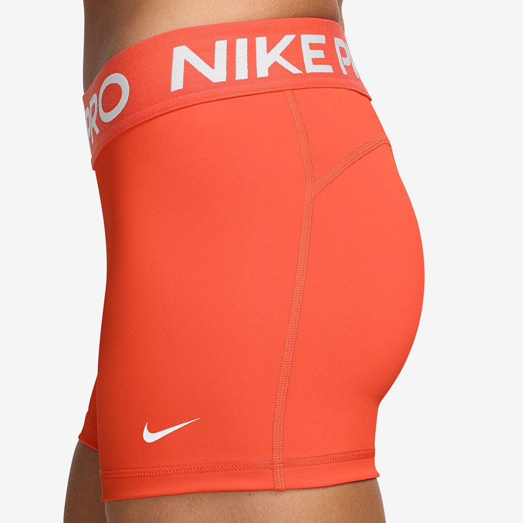 womens nike shorts orange