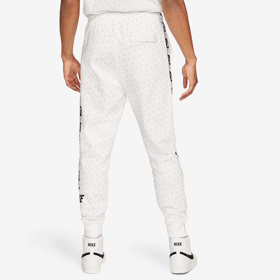 nike repeat print track pants