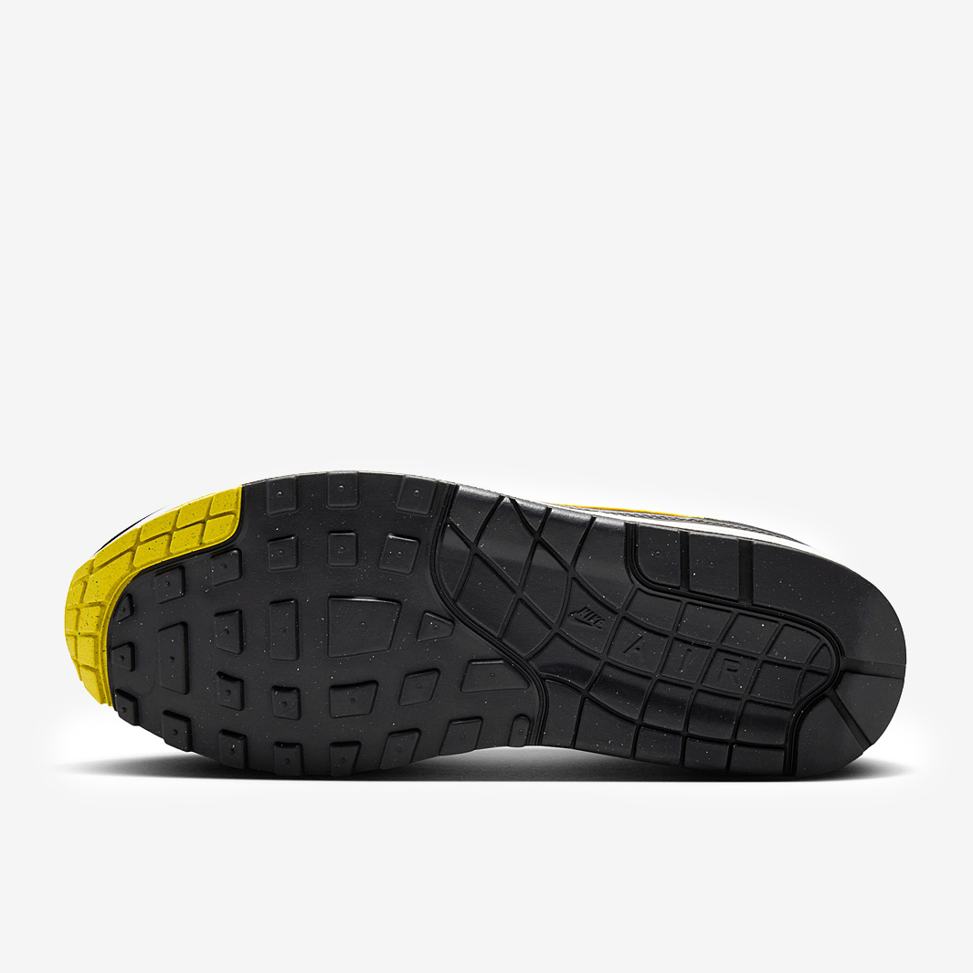 black and yellow nikes