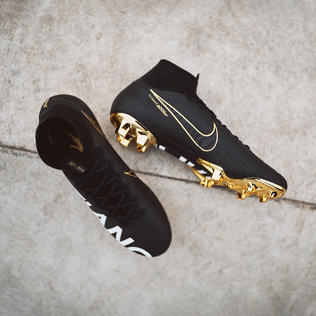 Cr7 black best sale and gold cleats