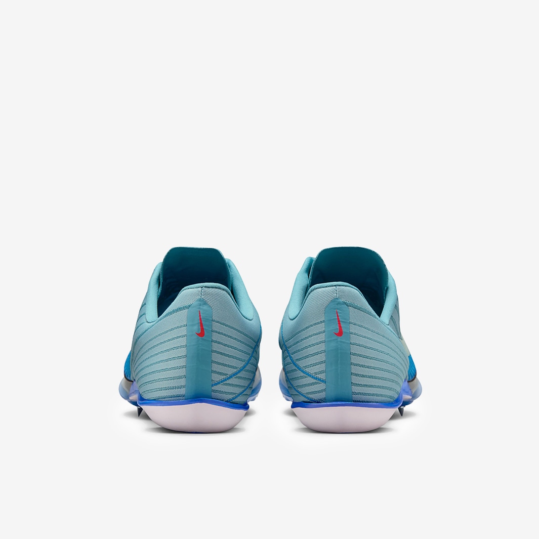 light blue nike spikes