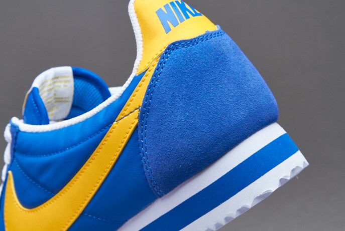 Royal blue and outlet yellow nike cortez