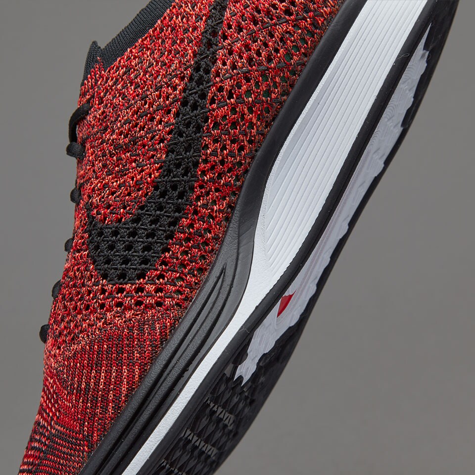 nike flyknit racer black red