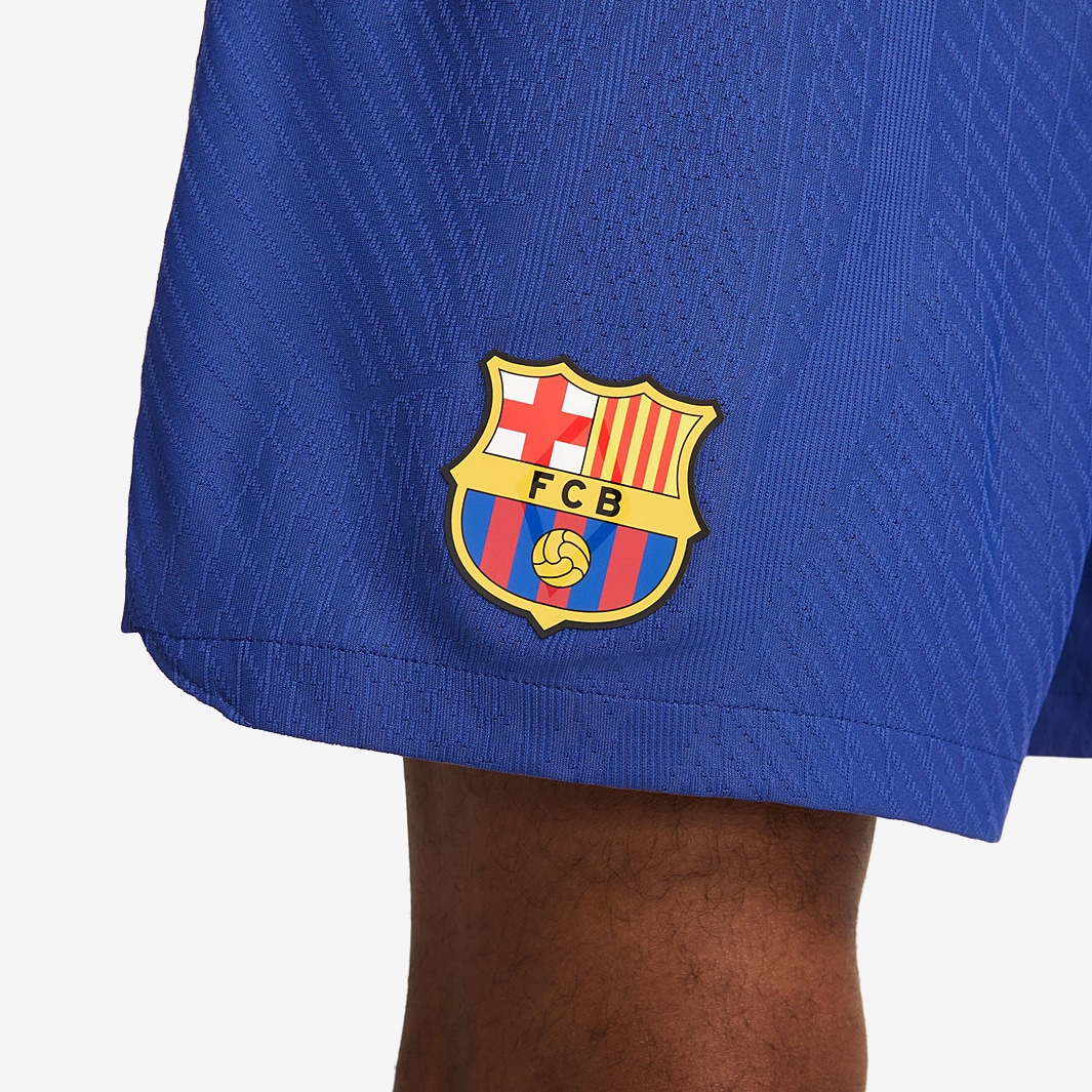 NIKE FC BARCELONA 21/22 PREMATCH JERSEY (ORANGE/BLUE)