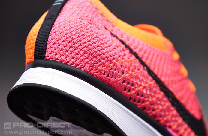 Pink nike flyknit racer on sale