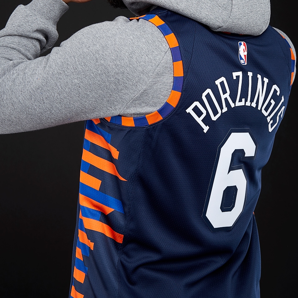 Kristaps Porzingis Mavericks Earned Edition Men's Nike NBA Swingman Jersey.