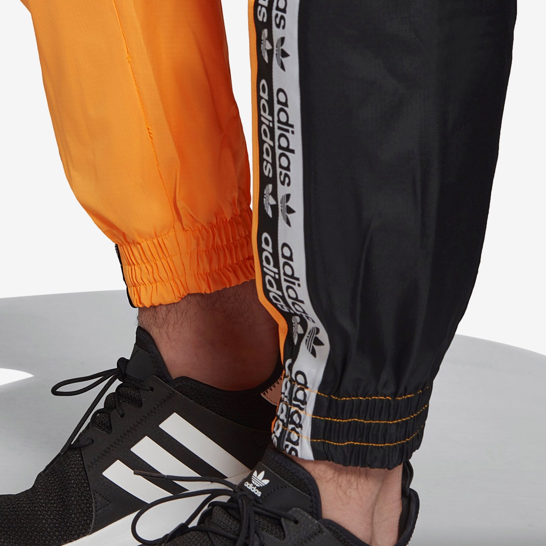 Adidas originals womens ryv track pant flash outlet orange