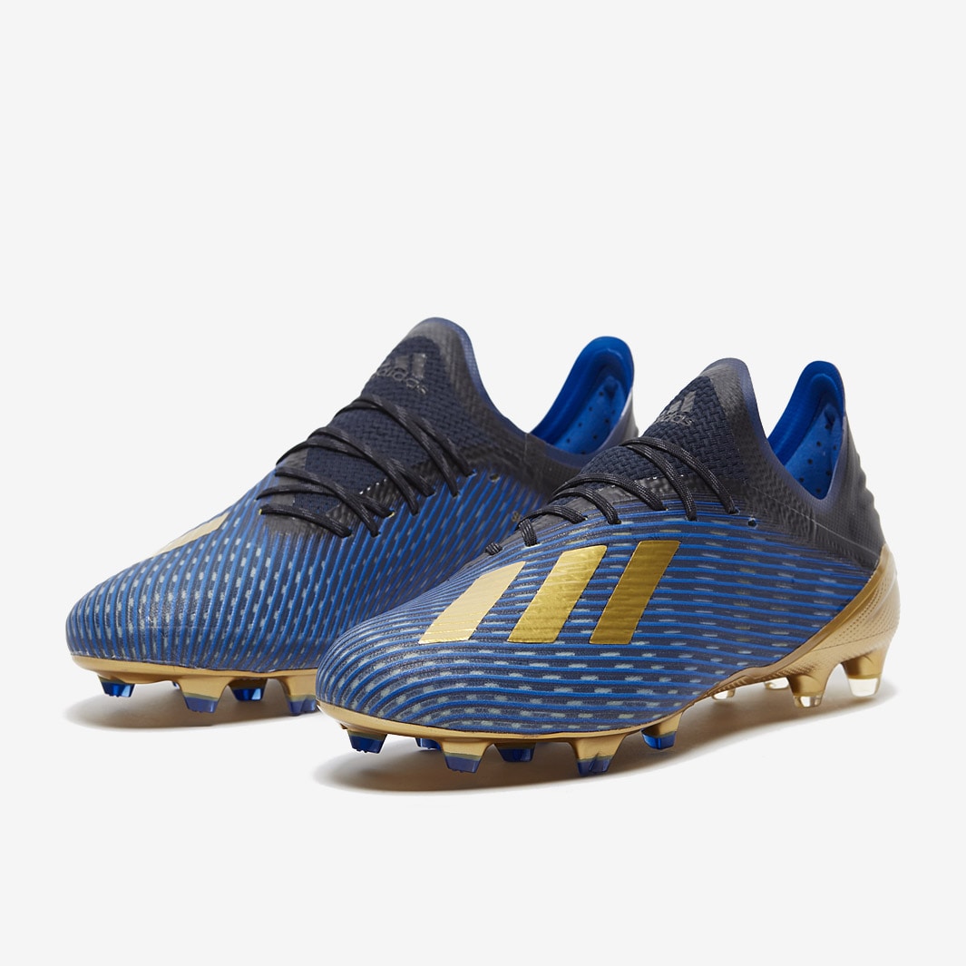 adidas X - Negro/Oro Metalizado/Azul - Firmes - Botas de fútbol | Pro:Direct Soccer