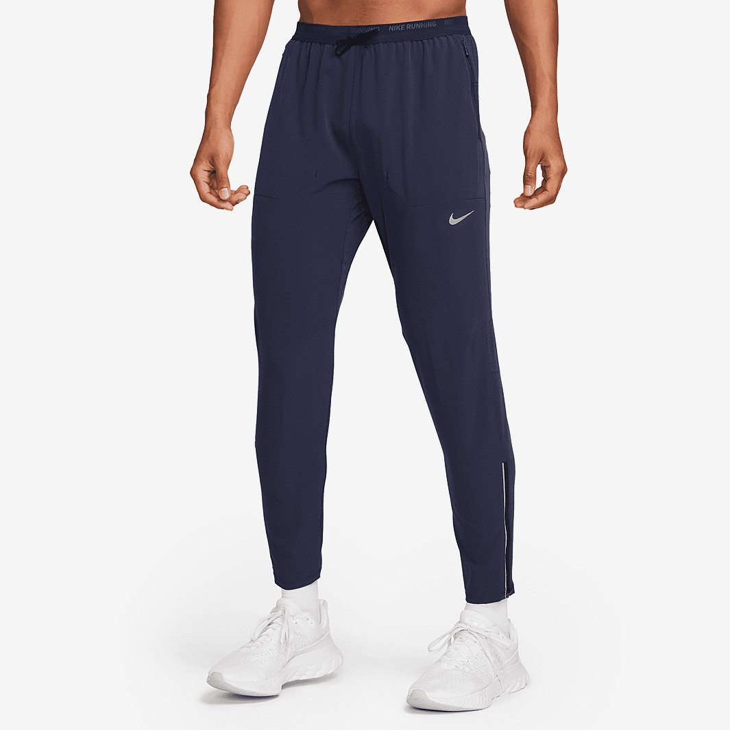 pantalones nike grises hombre