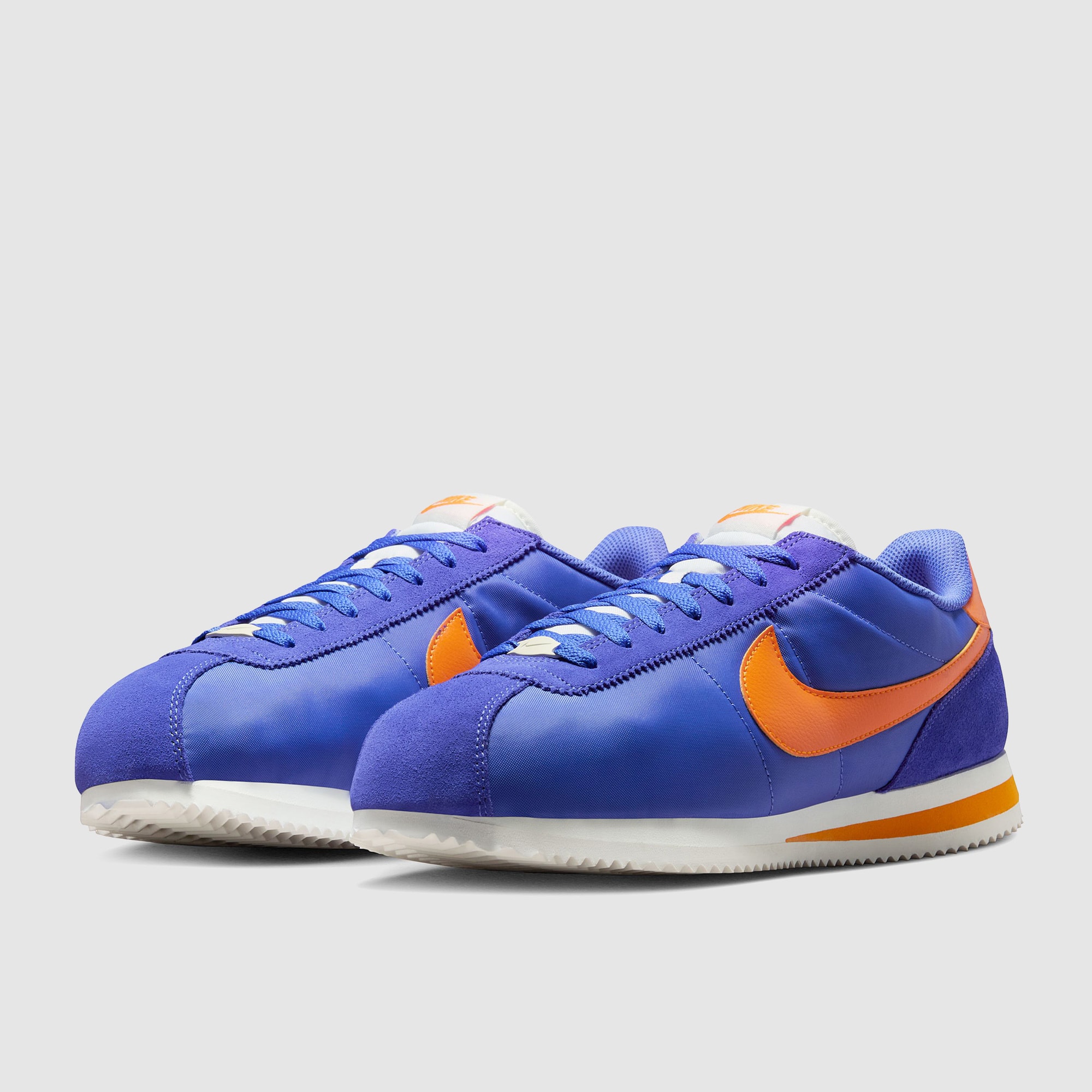 nike cortez orange and blue