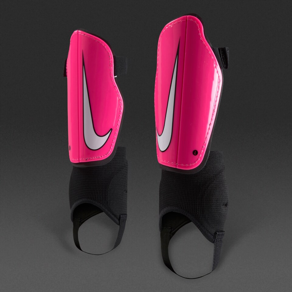 Buena voluntad Red Alojamiento Espinilleras Nike Charge 2.0 para niños-Espinilleras de futbol-Rosa/Blanco  | Pro:Direct Soccer