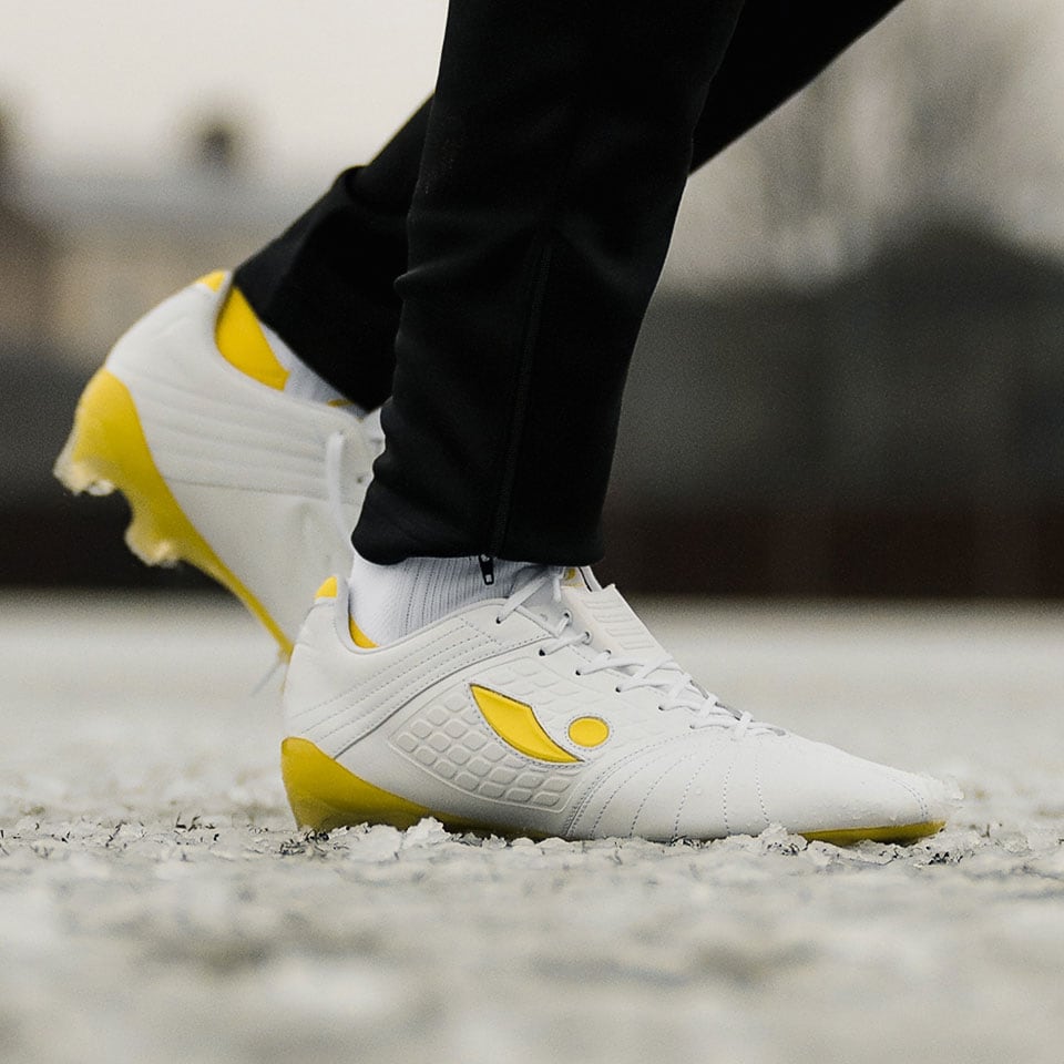 neon colored soccer cleats