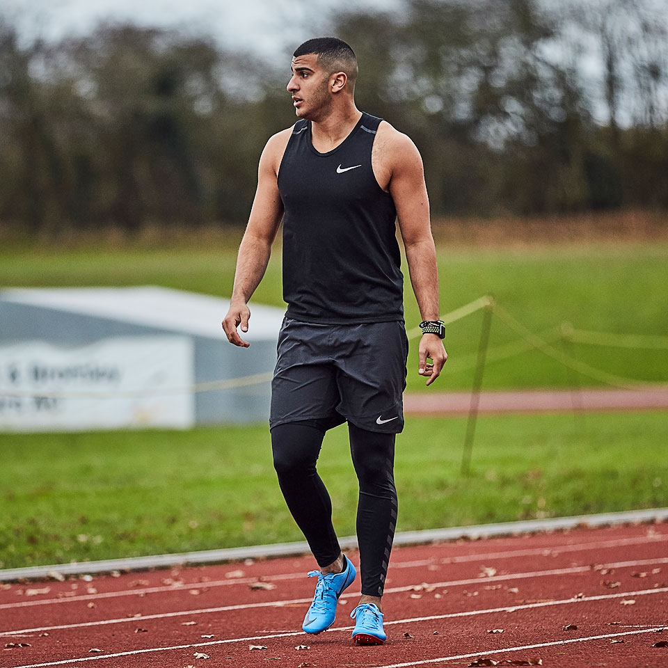 nike tailwind running top mens