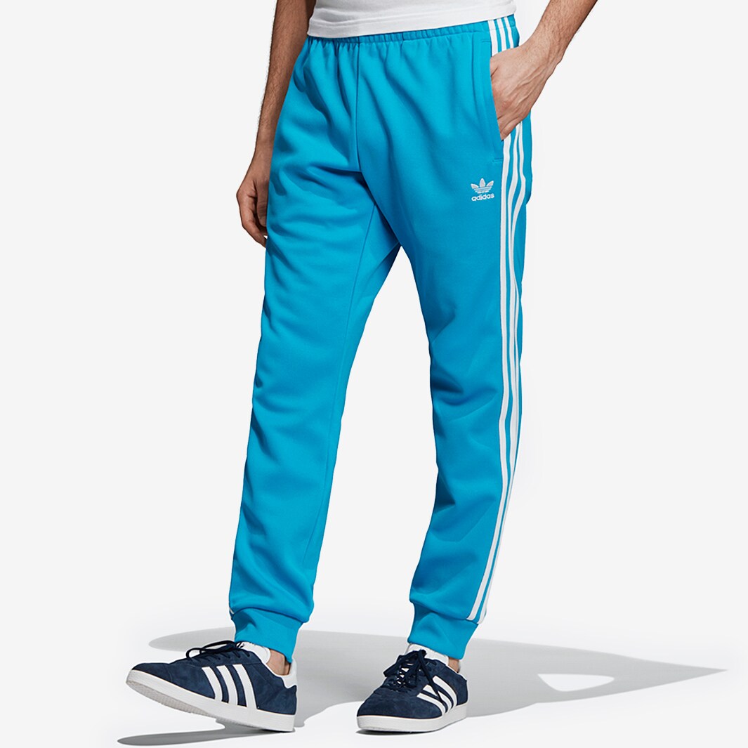 adidas SST Track Pant - Shock Cyan - Mens Clothing | Pro:Direct Soccer