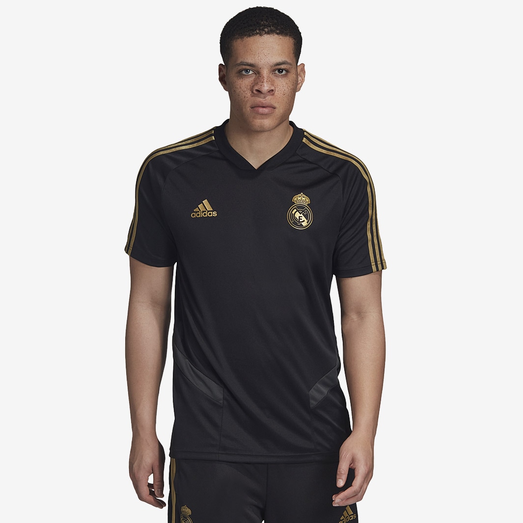 Crudo Adulto ella es Camiseta de entrenamiento adidas Real Madrid 2019/20 - Ropa oficial para  aficionados - Negro/Dorado Oscuro | Pro:Direct Soccer