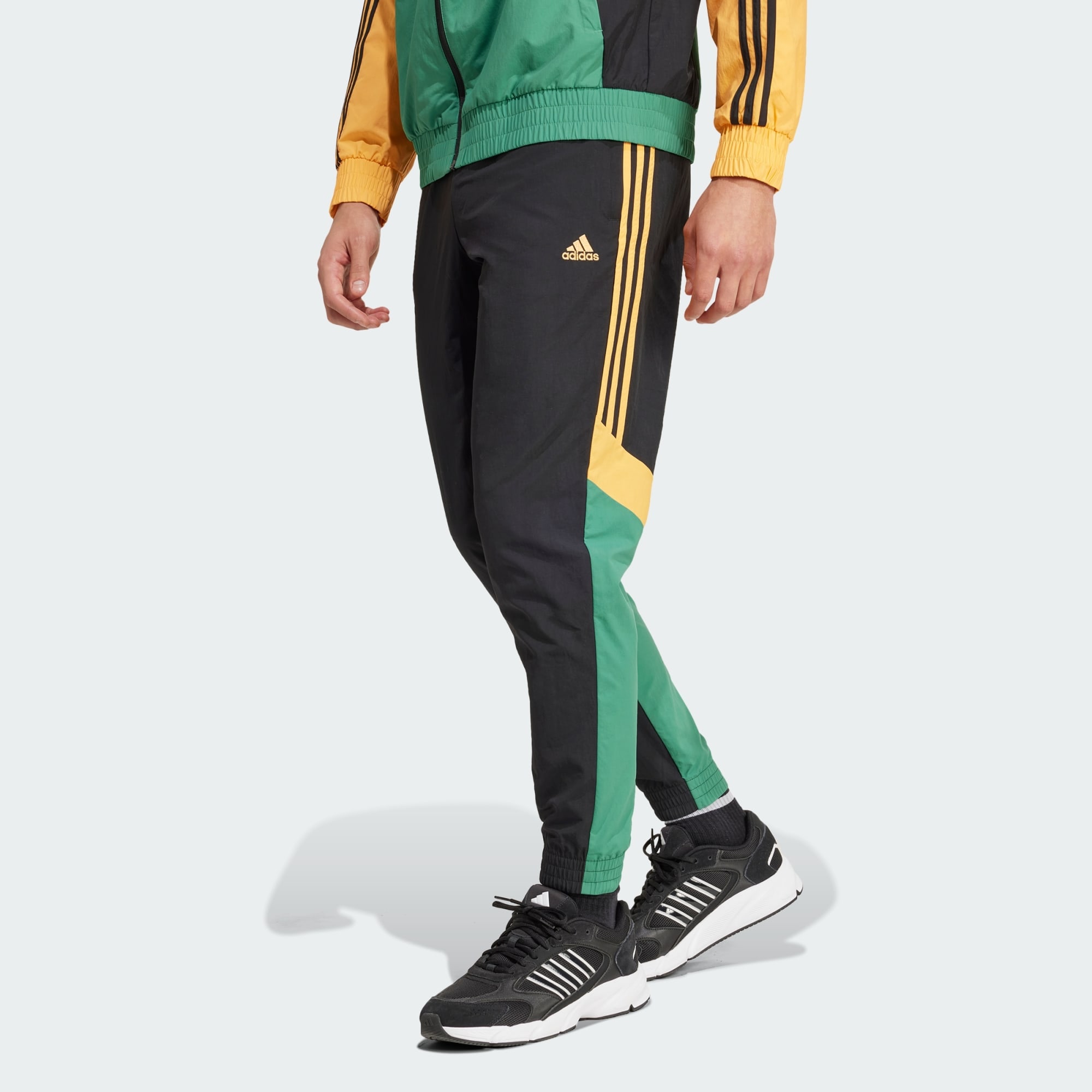 Black and yellow adidas track pants best sale