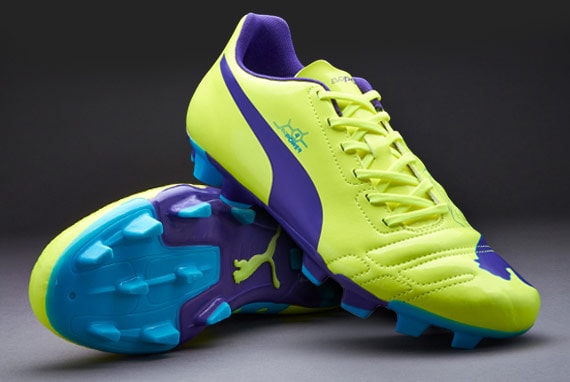 Botas de futbol Puma Puma evoPOWER 4 FG ninos Terrenos firmes Amarillo Fluorescente Violeta Pro Direct Soccer