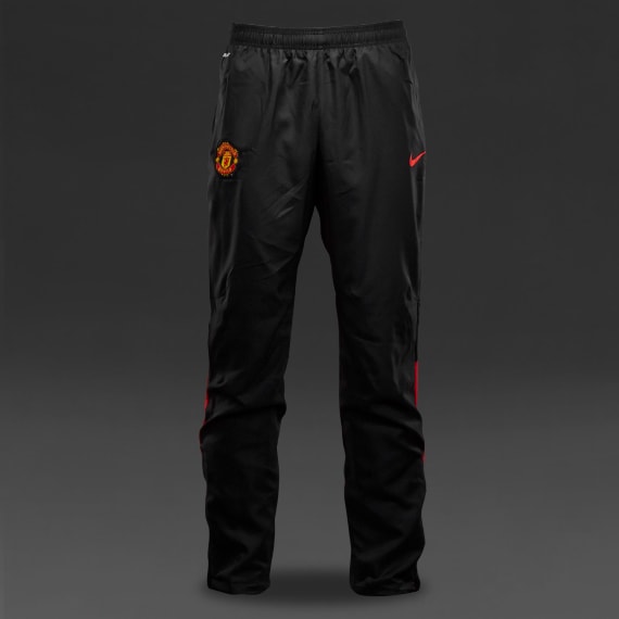 de futbol Nike- Pantalones Nike Manchester United Squad Sideline Woven- oficial futbol-Negro-Rojo | Pro:Direct Soccer
