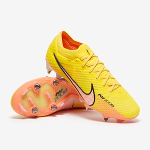 black and yellow nike boots