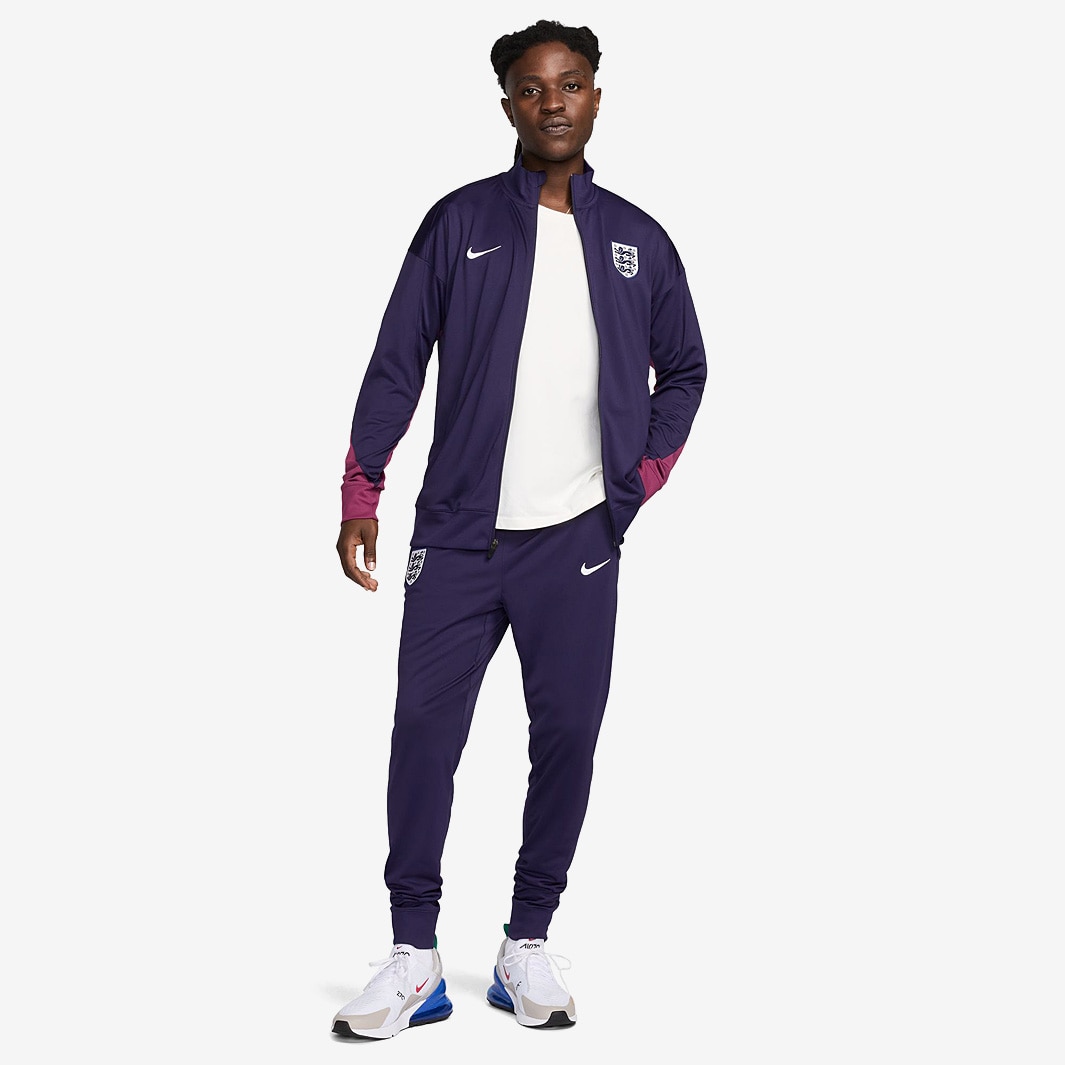 purple tracksuit nike