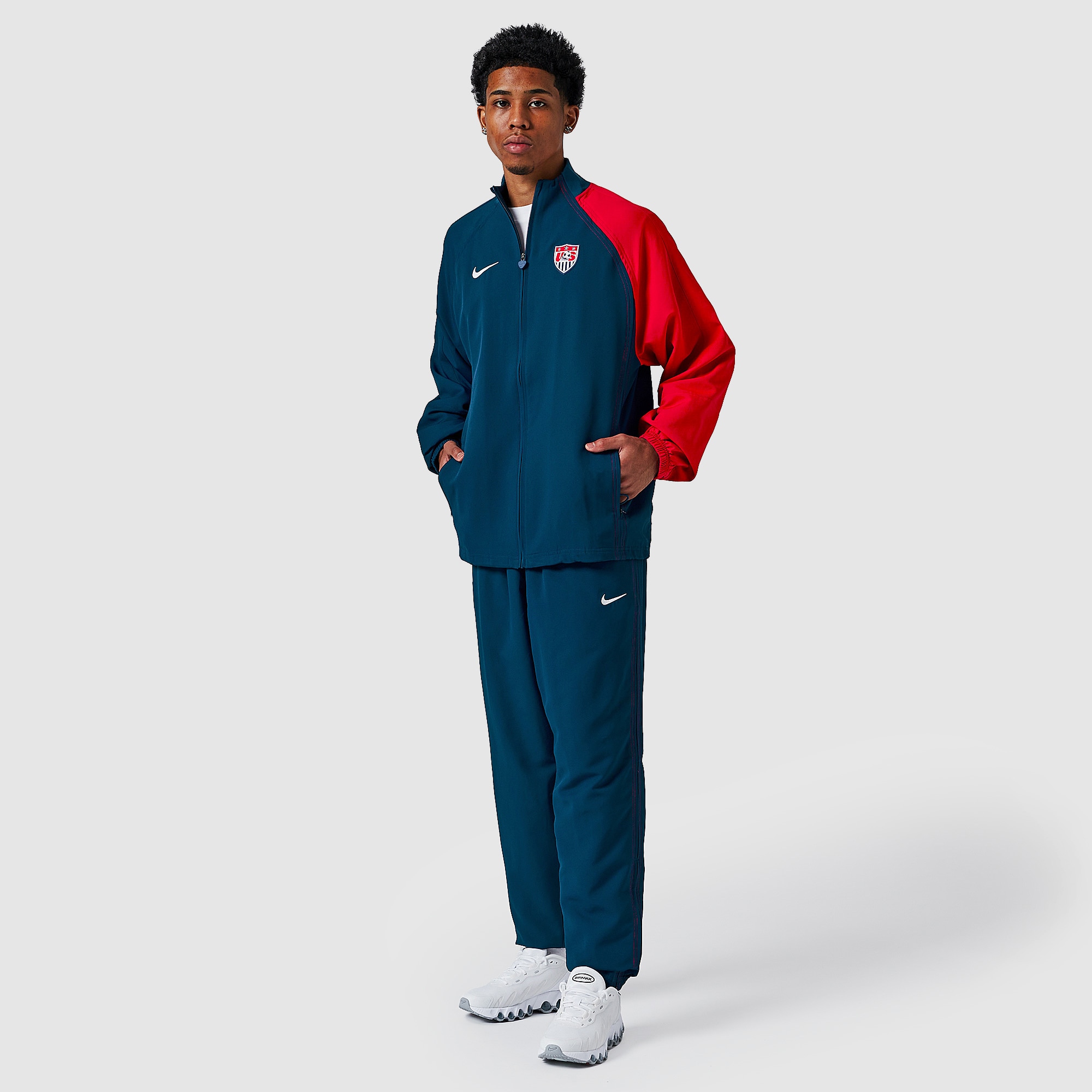 navy blue and red nike sweatsuit