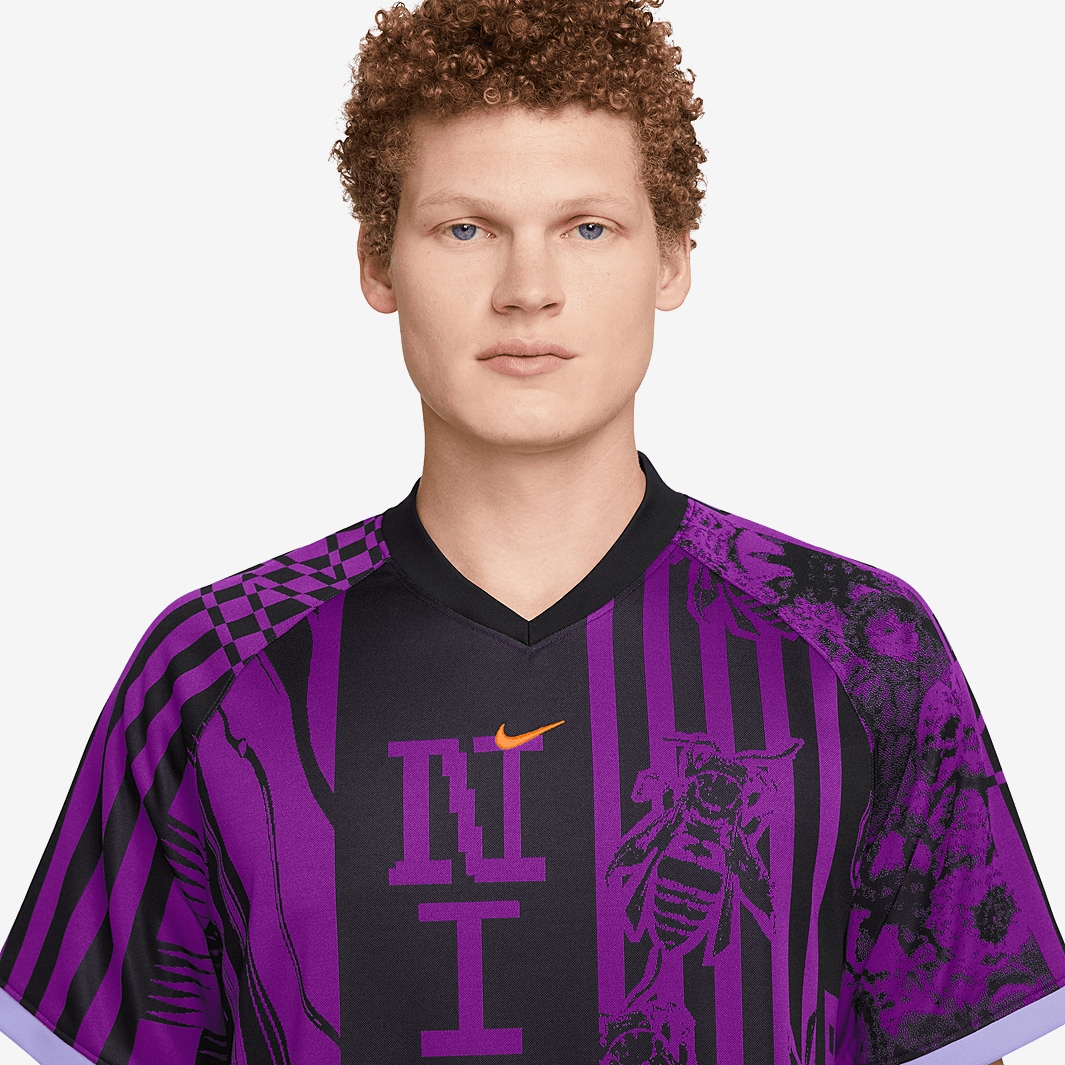 purple black nike shirt