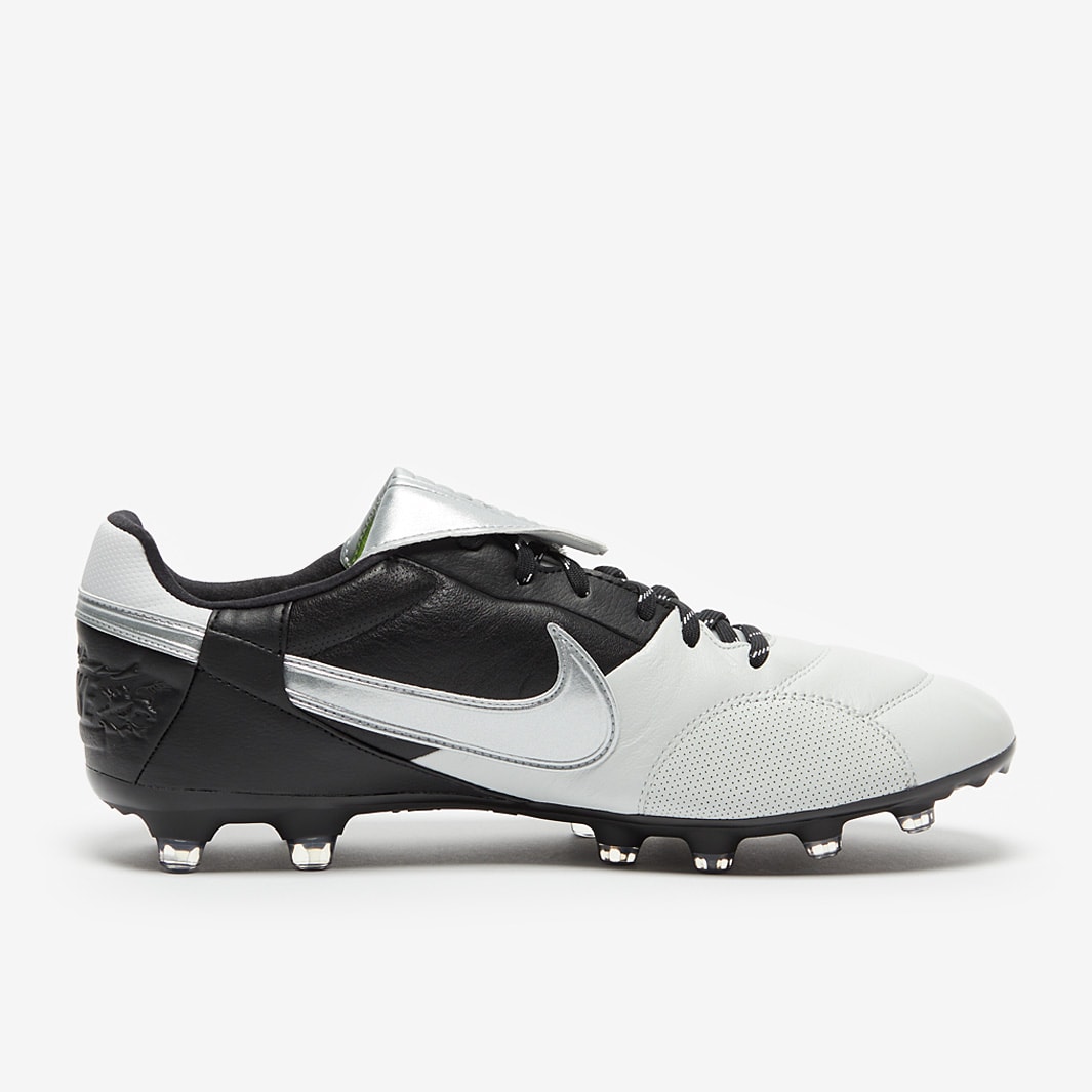 black and silver nike boots