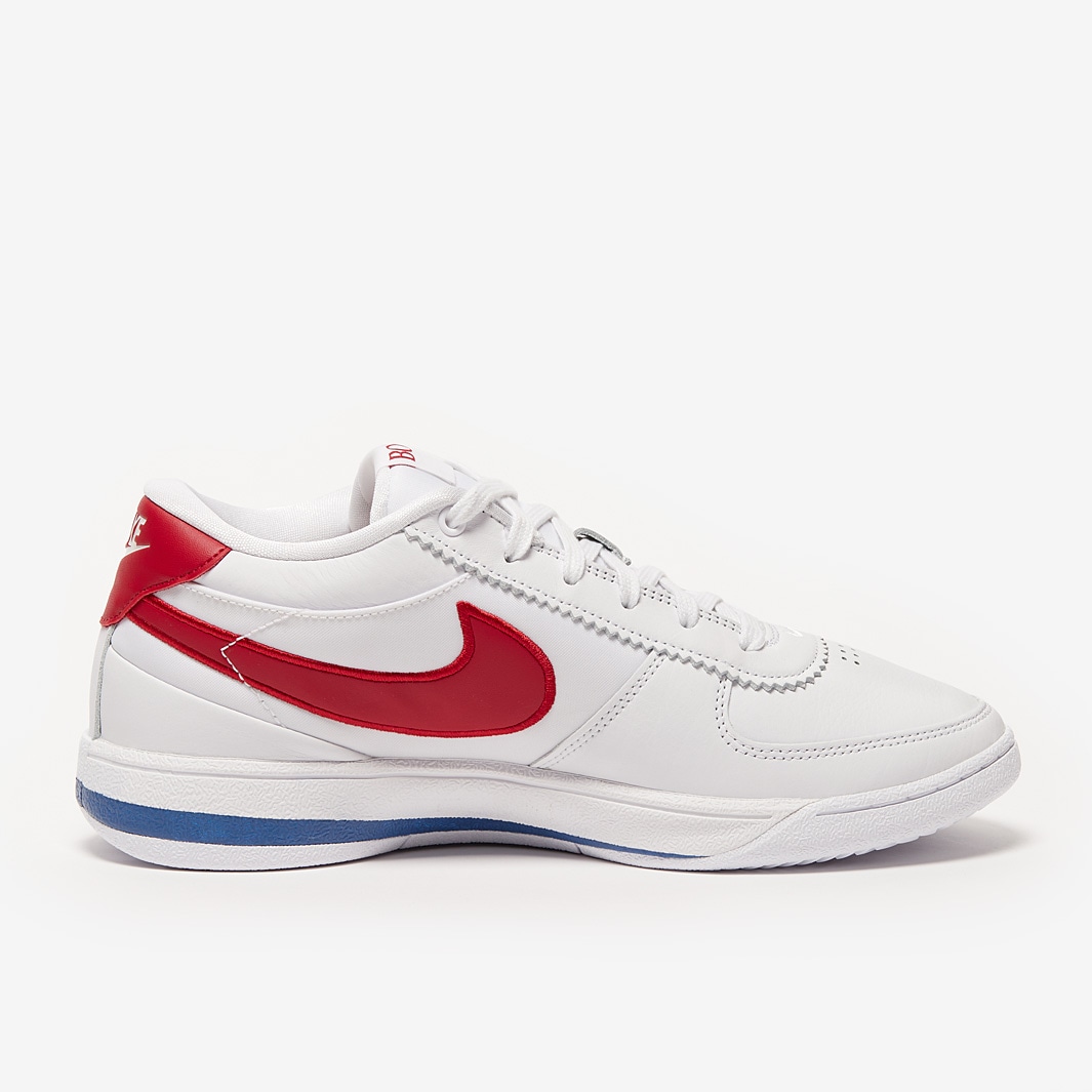 white nike shoe with red swoosh