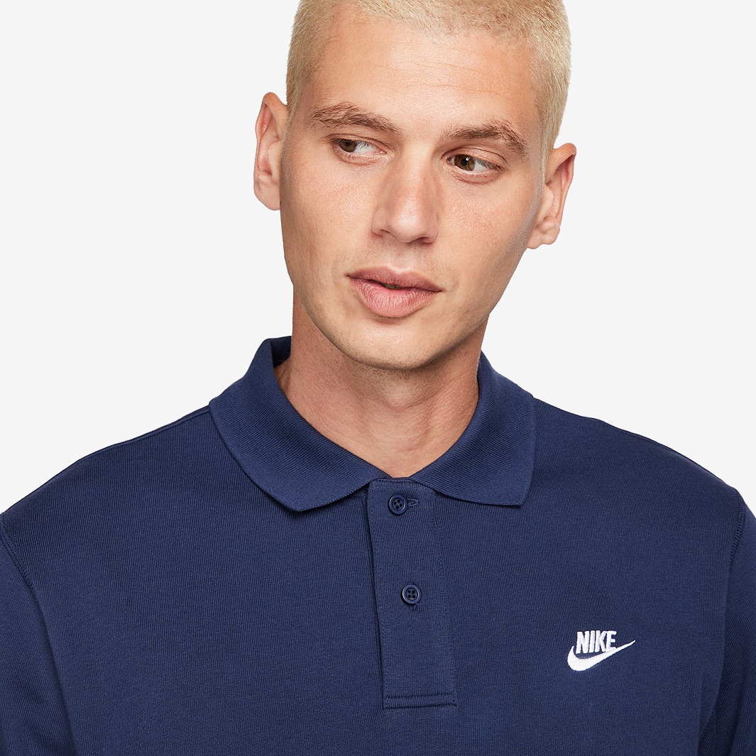 navy blue nike polo shirt