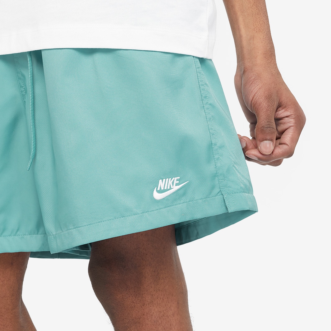 nike woven shorts teal