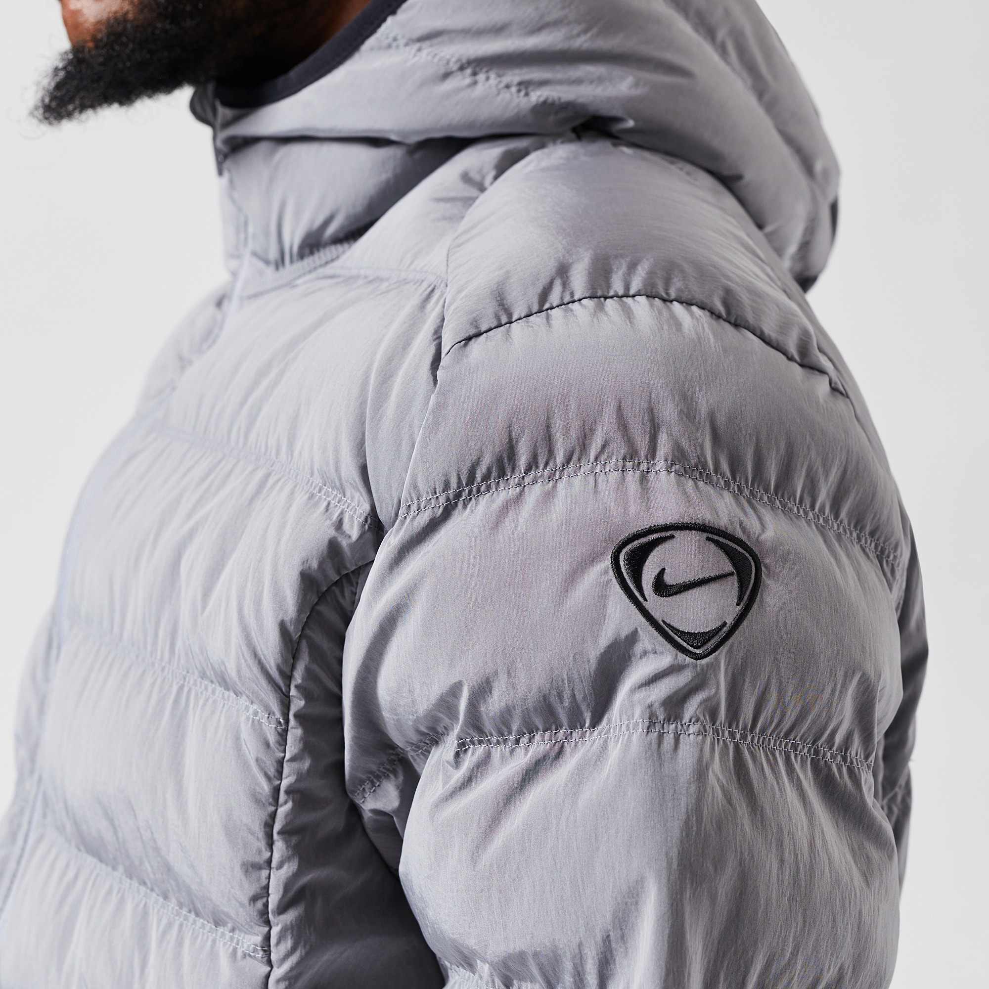 nike padded jacket grey