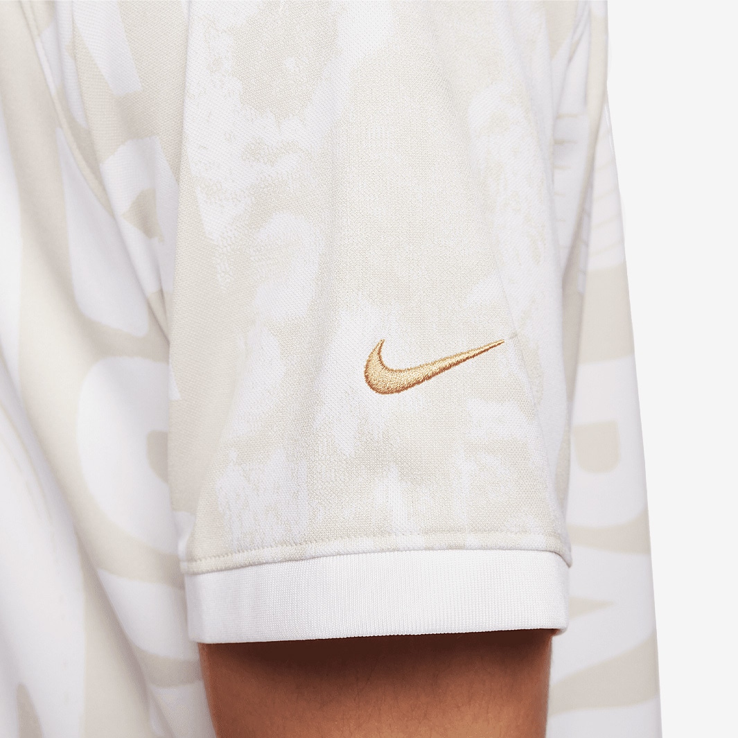 nike white gold shirt