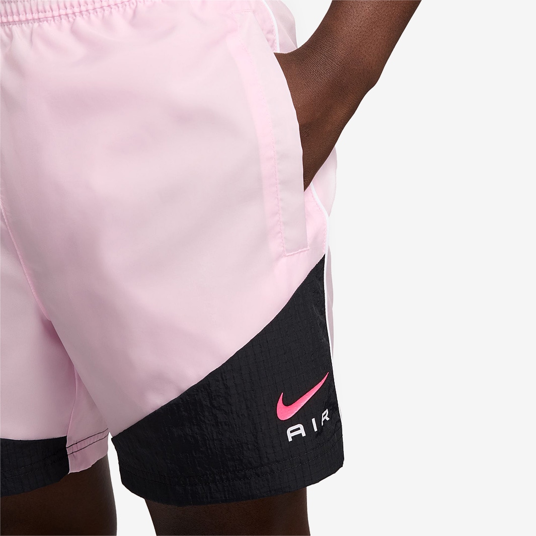 white and pink nike shorts