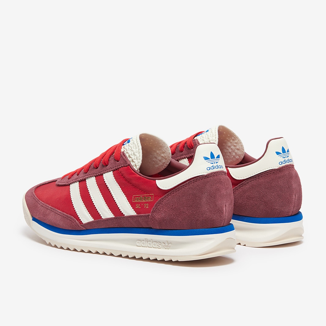 adidas shoes with red and blue on sole
