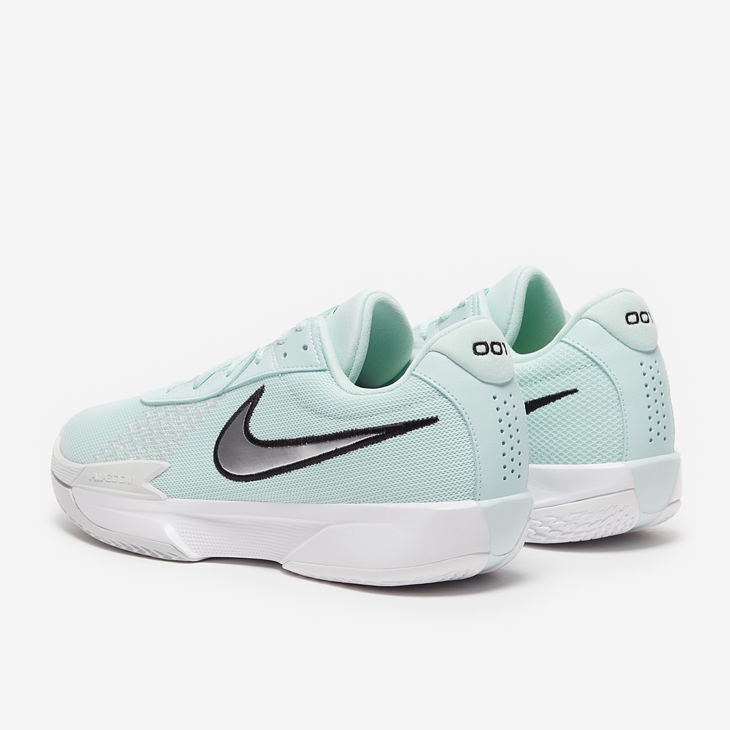white and teal basketball shoes