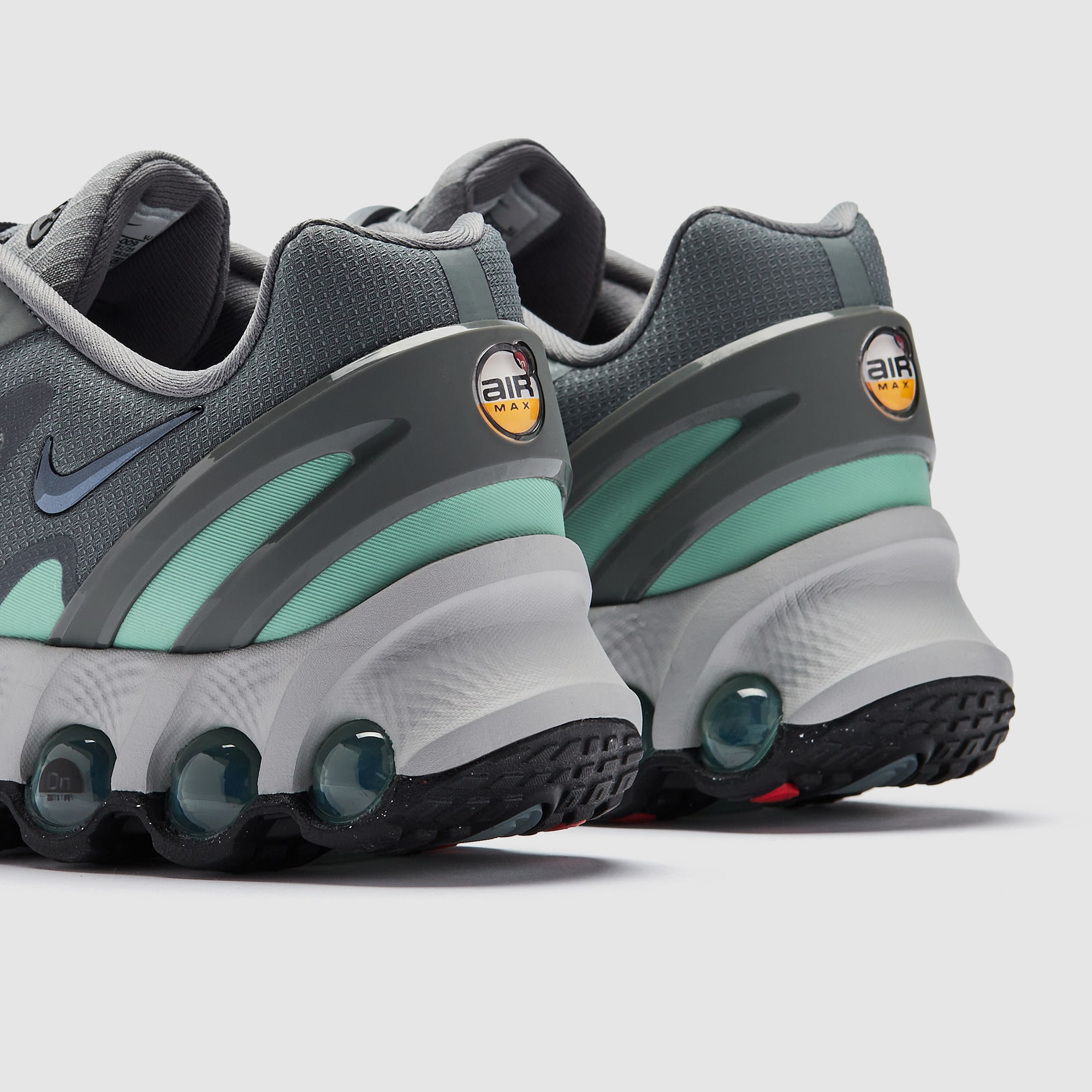 gray and green airmax