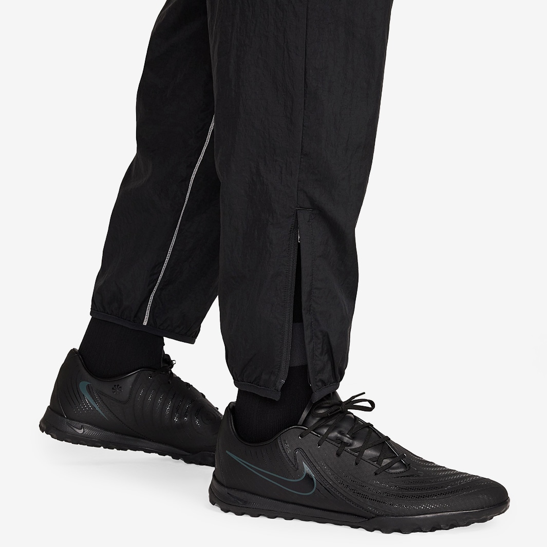 nike shut out track pants