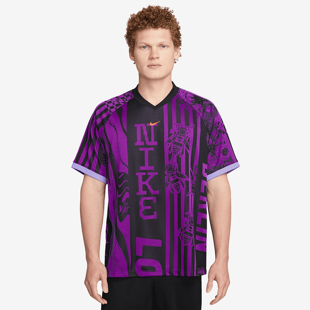 purple nike football shirt