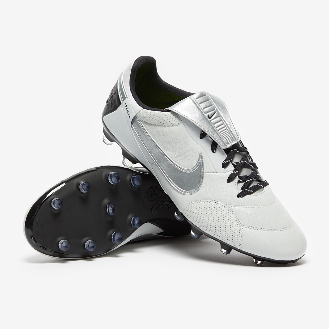 black and silver nike cleats