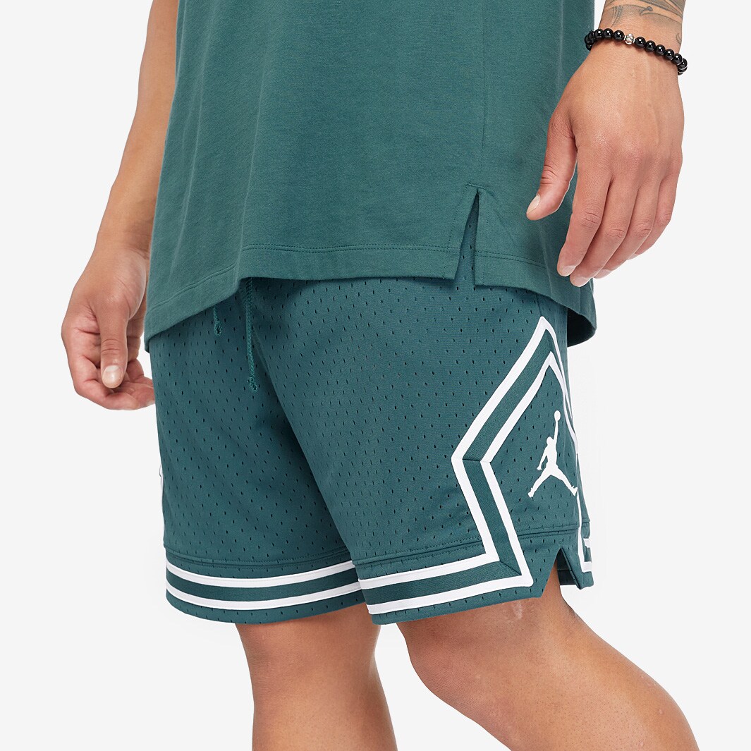green and black jordan shorts
