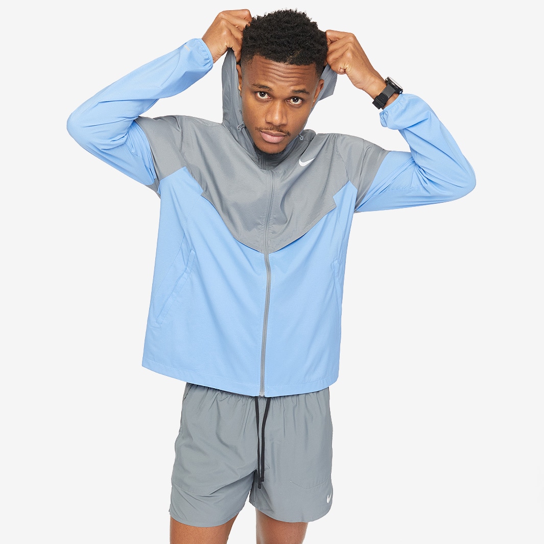 light blue windbreaker nike