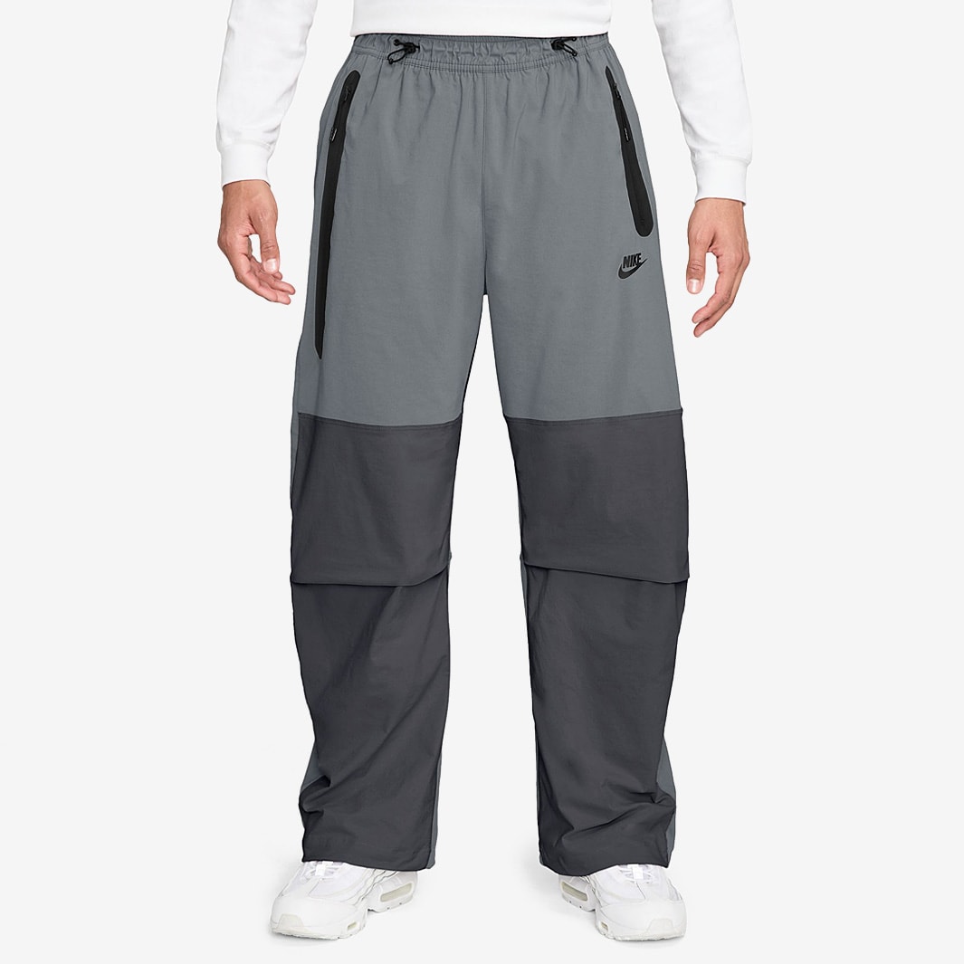 grey and black nike pants