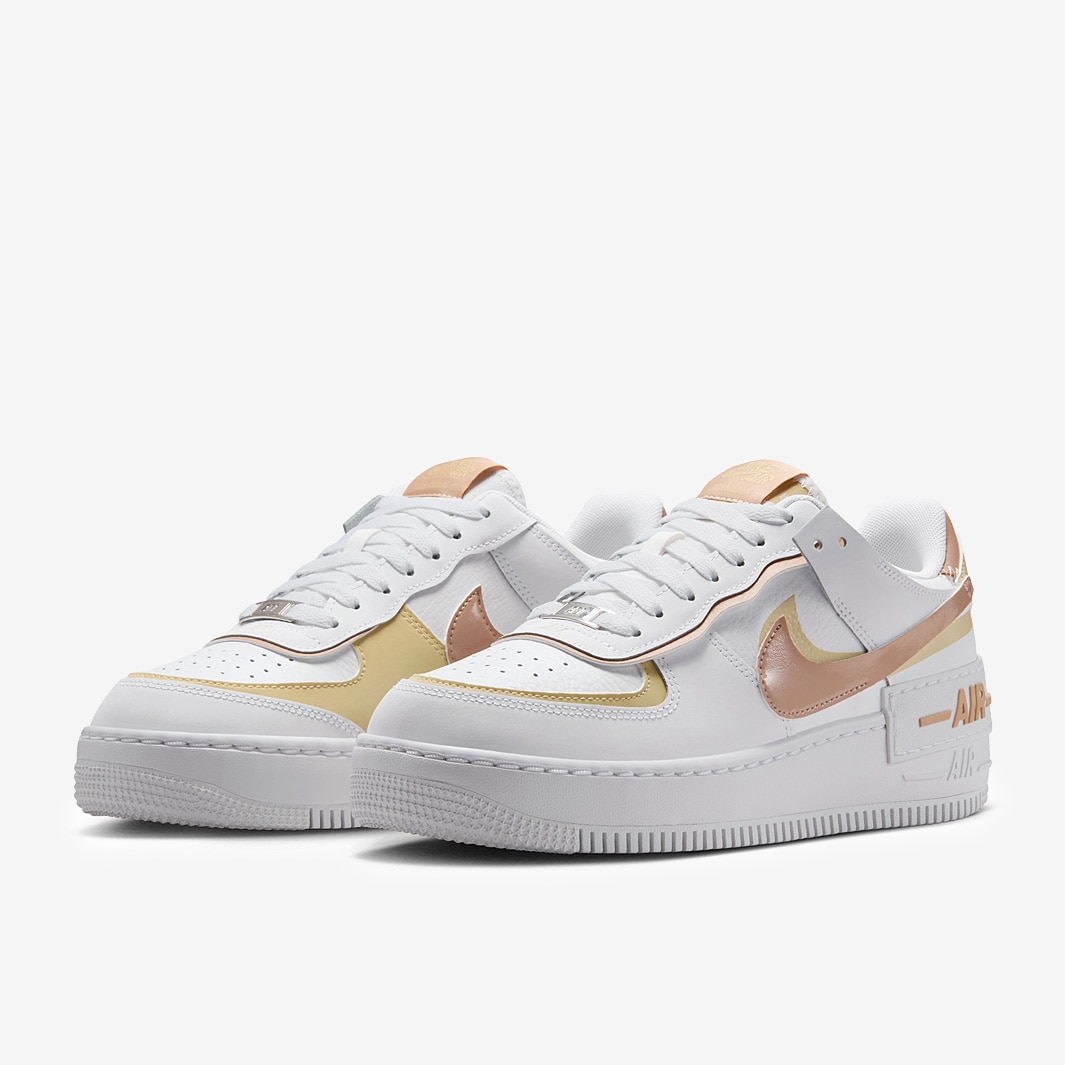 gold and white air force 1s